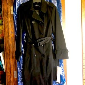 Brand new Rain coat XS